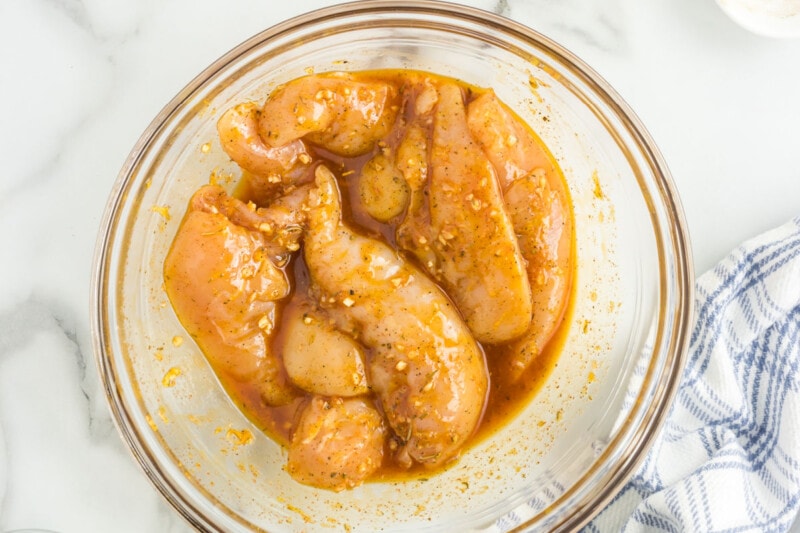 chicken tenders in marinade.