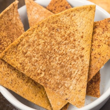 Healthy and Easy Baked Cinnamon Pita Chips which are sweet, salty, crunchy ,crispy and LOADED with flavor without the fat and NO sugar- It's protein packed too! {gluten free, vegan, sugar free recipe