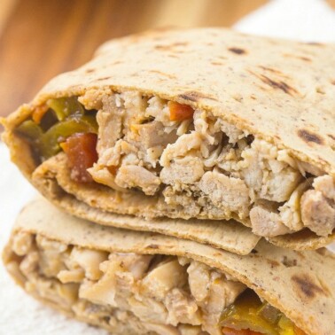 Healthy LOW CARB Mexican Chicken Wraps using a delicious flatbread which doesn't taste low carb at all- The filling is a flavor lover's dream- Sweet, spicy and filling! Freezer friendly too!