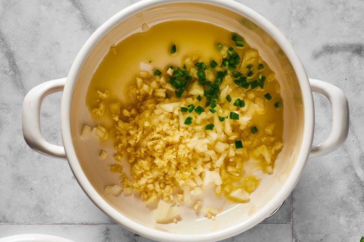 onions and garlic in soup pot.